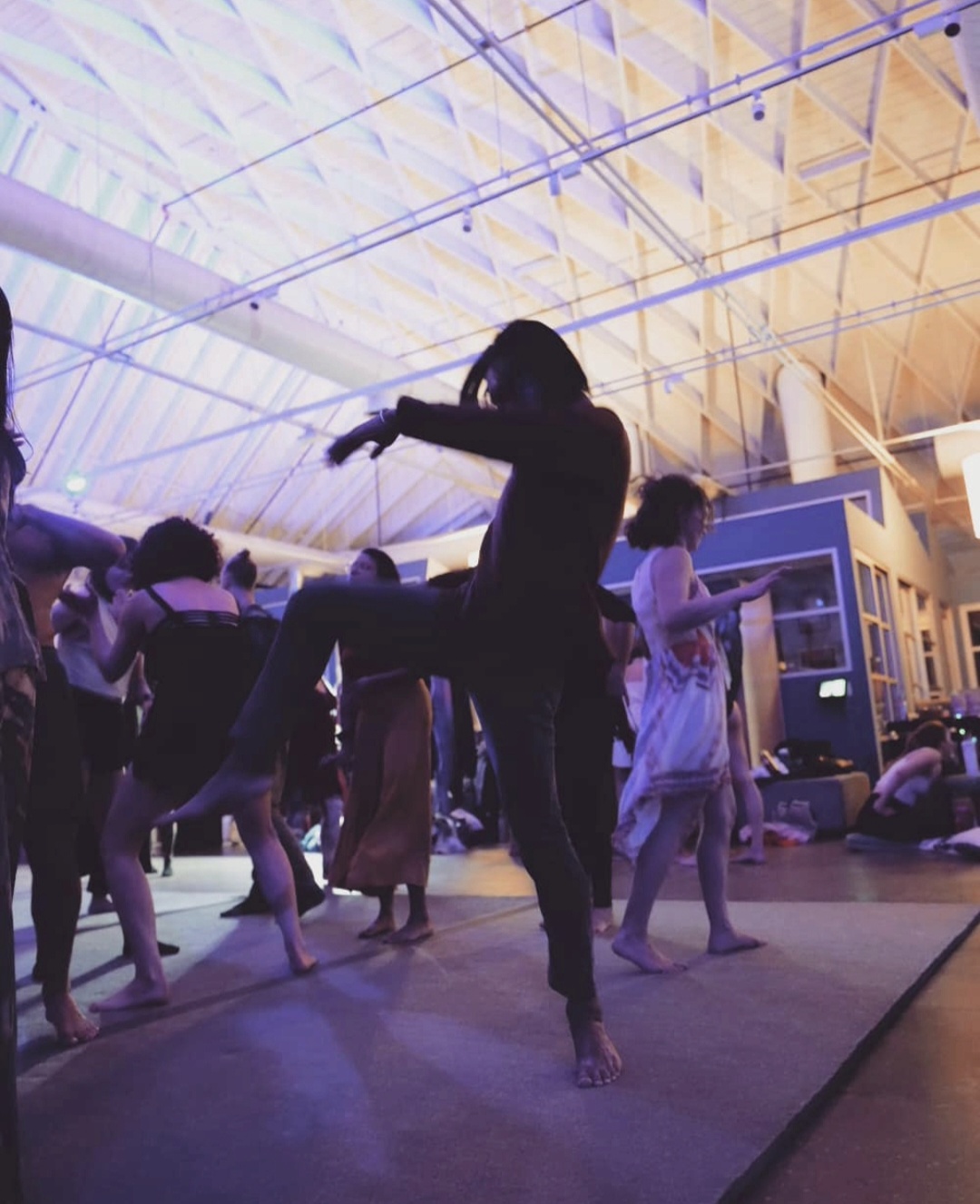 Ky dancing with a group in 2020